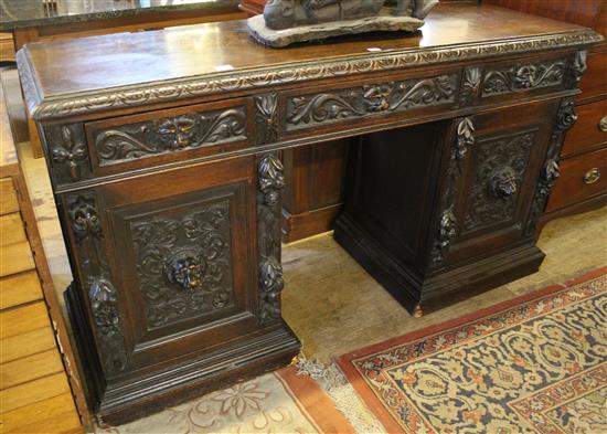 Large Flemish carved oak pedestal sideboard